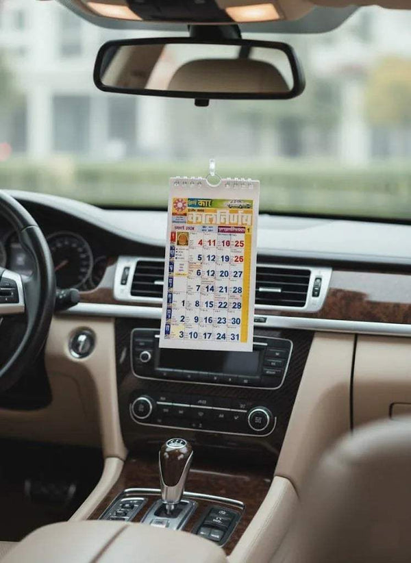 Car hanging calendar with date grid, clipped on dashboard