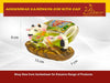 Decorative cow and calf figurine with multicolored cloth and brown rock-like base