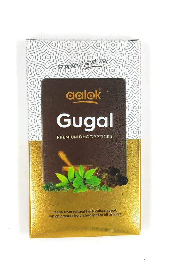 Gugal premium dhoop incense sticks box with green leaves and dark background
