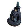 Lord Shiva backflow incense holder, side view of seated figure and dark cone