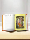 Open date diary with yellow cover, framed religious illustration and lined pages