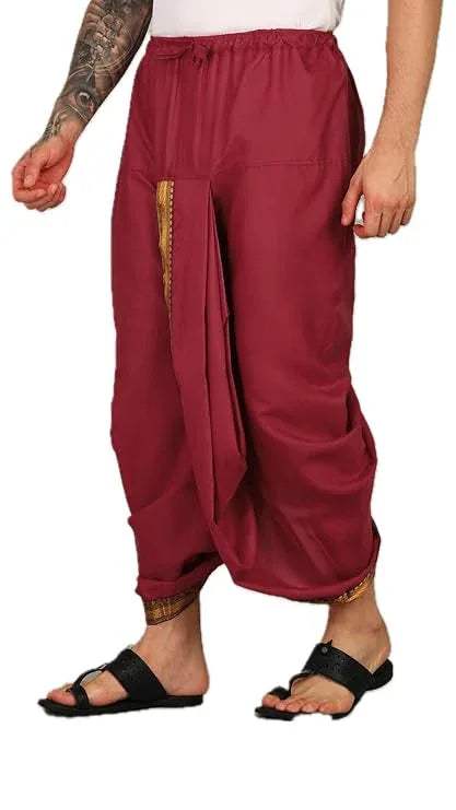 Red cotton dhoti with elastic drawstring waist and front pocket, gold-trim border.