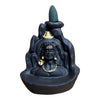 Lord Shiva backflow incense holder with seated figure and dark incense cone