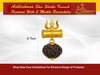 Gold trident pendant with dark rudraksha bead, shown with size label