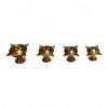 Four brass diya lamps in a row with star-shaped bowls and pedestals