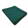Green wool meditation mat, neatly folded with neat stitched border