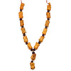 Sandalwood mala necklace, carved amber beads with dark brown center charm bead