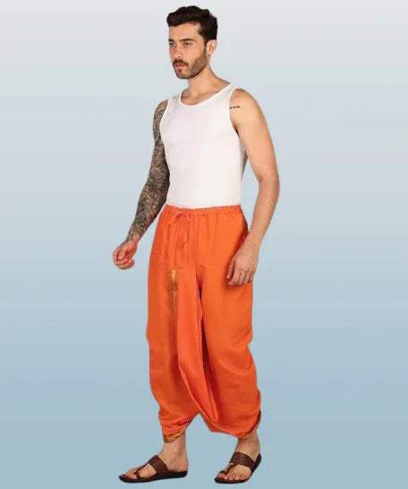 Orange cotton dhoti with draped harem fit and gold embroidered slit panel