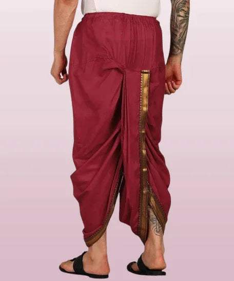 Red dhoti with pleated front and vertical gold embroidery border, relaxed fit