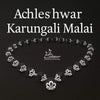 Wood mala necklace with black beads and silver-toned flower-shaped spacers