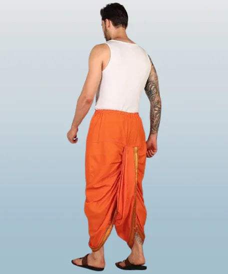 Orange cotton dhoti, back view, draped fit with drawstring waist