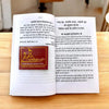 Open Hindi book with two pages of text and maroon title graphic