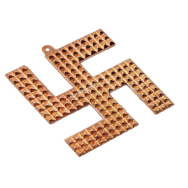 Copper swastik pyramid wall hanging, close view of raised triangular studs and cutouts