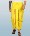Yellow cotton dhoti with relaxed legs and vertical embroidered border detail