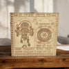Close-up of pure copper Shri Panchmukhi Hanuman yantra plaque, engraved figure and circular seal