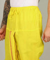 Yellow dhoti front view with pleats and vertical striped border panel