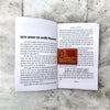 Open Hindi tantra book with two pages of dense printed text