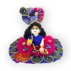 Black curly hairpiece on Gopal doll, front view