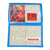 Open Hindi prayer katha book with colorful deity art and printed pages