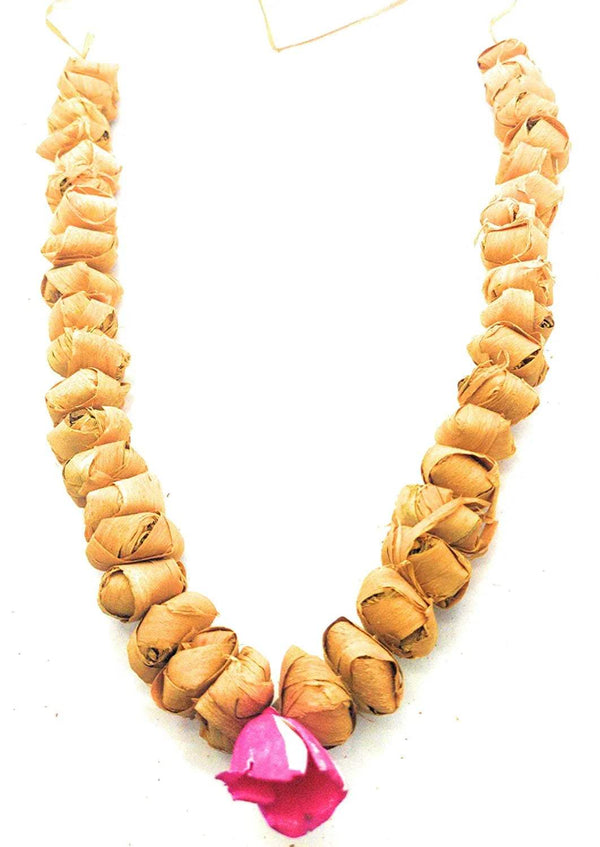 Carved bead mala with pink center flower bead and braided ends