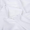 White cotton gamcha patka with textured weave and soft folds