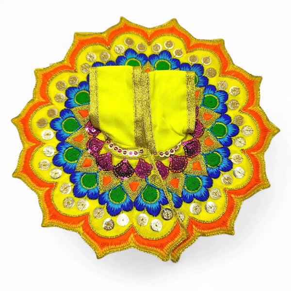 Embroidered deity poshak dress with lime green center cloth and orange-yellow floral fan