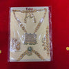 Decorative full shringar jewelry set with gold-tone kundan-style necklace and pendant pieces