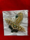 Jeweled gold-tone hanging decoration with green stones and dark bead tassels