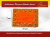 Orange velvet pooja aasan cloth with patterned gold border and green accent details