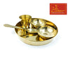 Gold-tone bhog thali set with ladle and four small bowls on a round tray