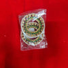 Decorative gold-tone bangle set with green stones, in clear plastic pouch