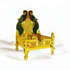Gold-plated brass singhasan throne with peacock-style topper and ornate engraved base.
