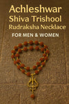 Rudraksha bead necklace with gold trishool pendant and small dangling bead.