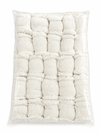 Cotton wick bundle in white fabric wrap, square pack with multiple braided strands.