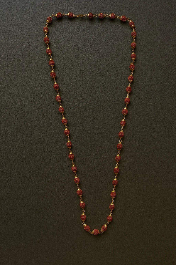 Rudraksha mala necklace with dark red-brown beads and gold tone end caps