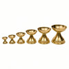 Set of brass diya oil lamps in varying sizes, from small to large