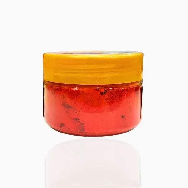 Vrindavan roli powder jar with yellow lid, red powder inside