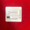 Rudraksha certification packet back with printed details on white label