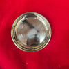Round brass pooja thali, top view, concentric rim detail
