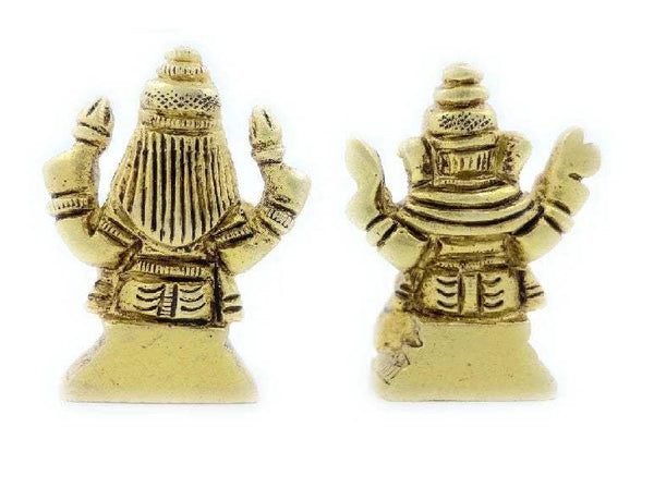 Small Ganesh-Laxmi idol in gold tone, rear view with flared garment and raised arms