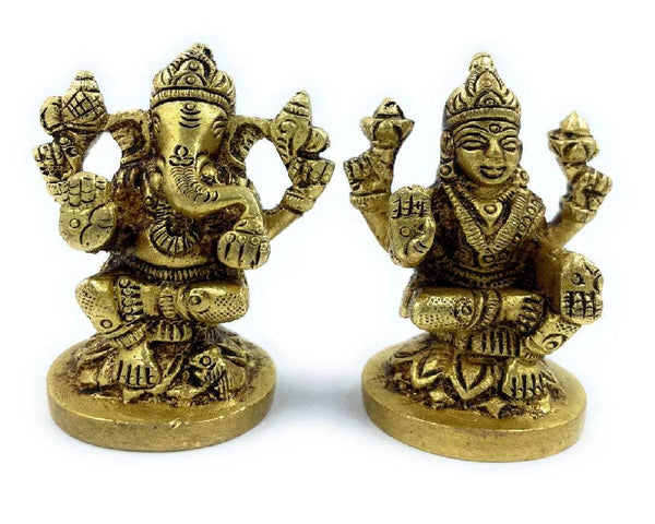 Golden Lakshmi and Ganesha sitting figurines on round bases