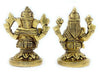 Golden Lakshmi and Ganesha seated figurines with ornate crowns on round bases