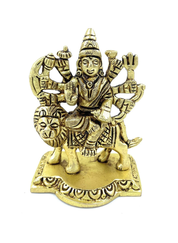 Durga Mata statue, seated on lion with multiple raised hands, brass-gold finish