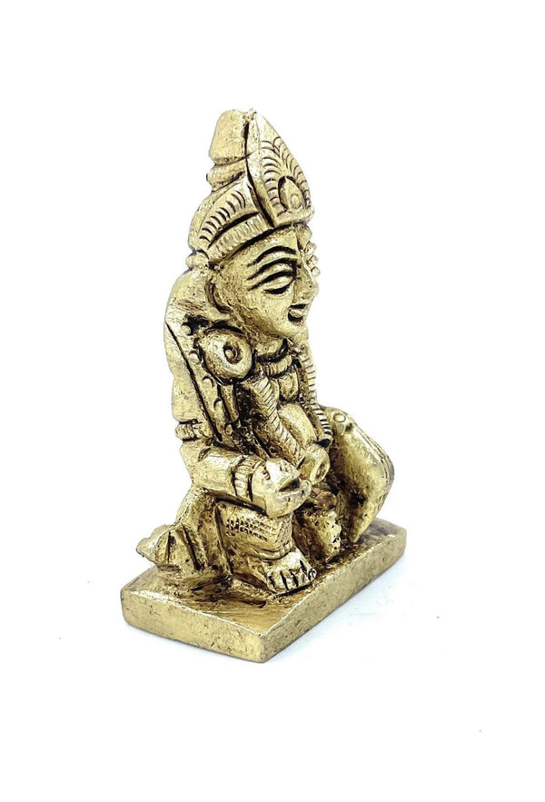 Kuber deity idol small figurine, side view seated with ornate headgear