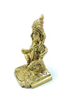 Gold-tone standing Kuber statue with folded hands and detailed draped clothing