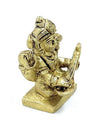 Gold-toned Saraswati deity idol, seated holding veena, hands posed in prayer