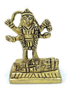 Gold-tone Kali goddess idol figurine with raised arms and carved pedestal base