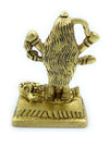 Gold-tone Kali goddess idol figurine, back/side view with raised arms, pedestal base
