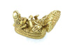 Gold-tone Vishnu and Laxmi figurine angled view, seated on patterned serpent coils