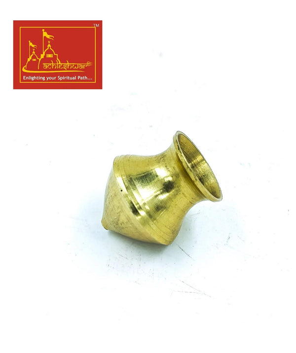Gold-toned brass Shiva abhishek cup, small flared opening, angled view